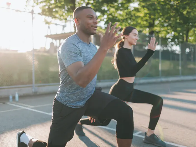 Two people exercising.