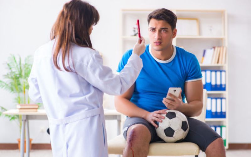 A school student during a sports physical.