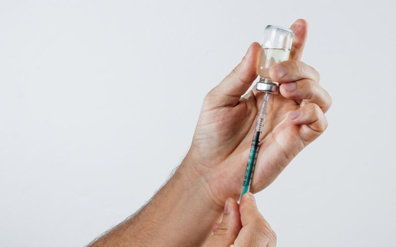 IV medication in bottle for shot.